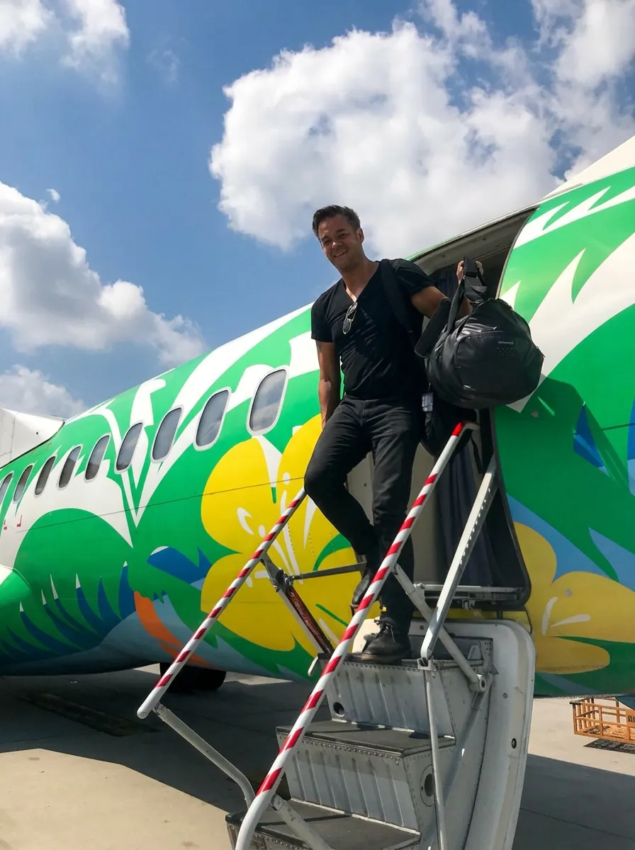 Bangkok Airways aircraft with tropical livery at Trat Airport