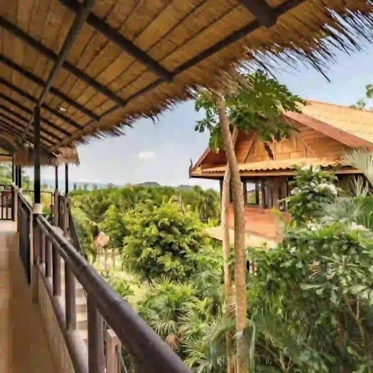 Tropical wooden bungalow nestled in lush greenery on Koh Mak