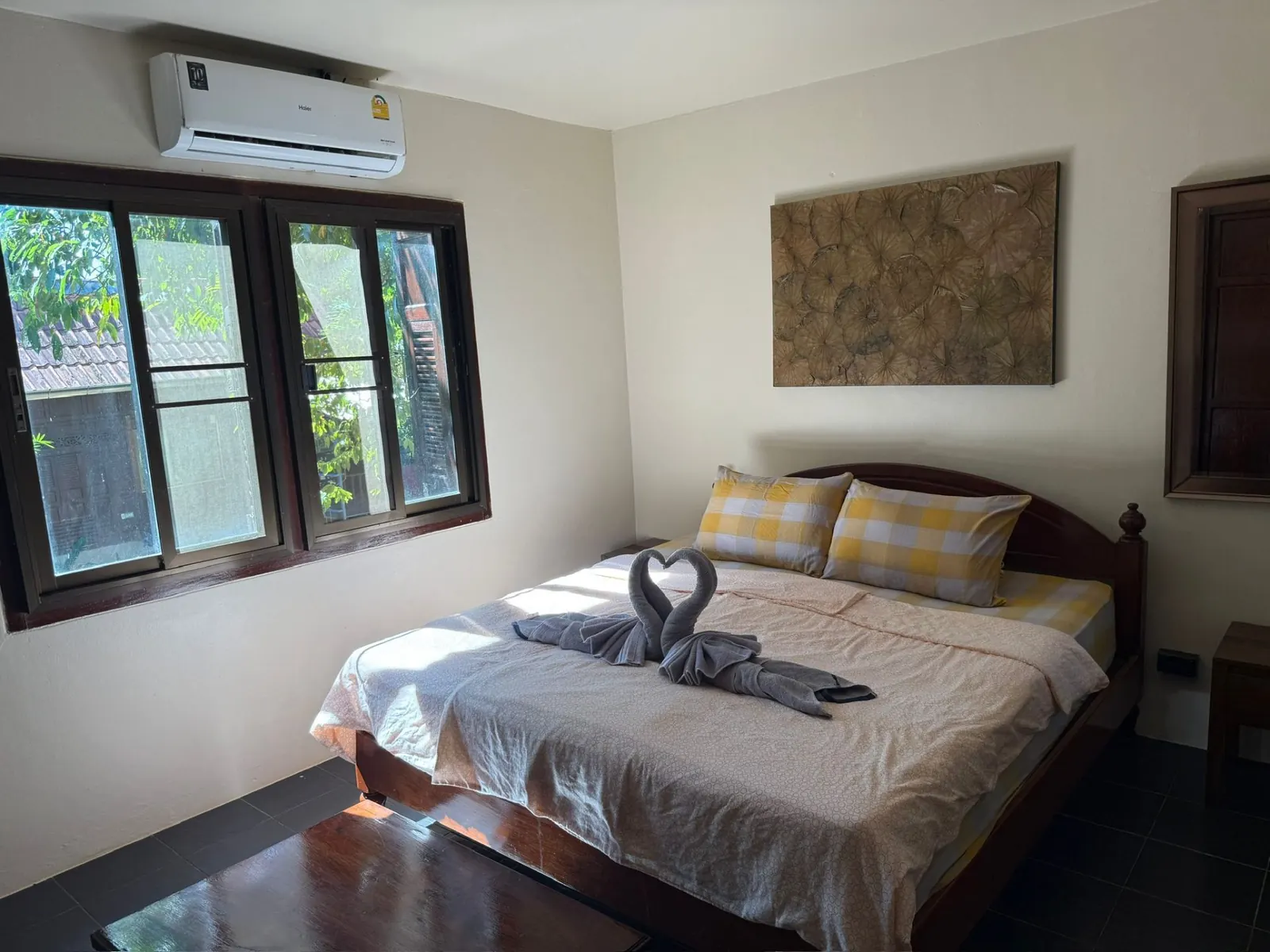 Second bedroom with king bed, AC and garden window at Sugarcane Villa, Koh Mak