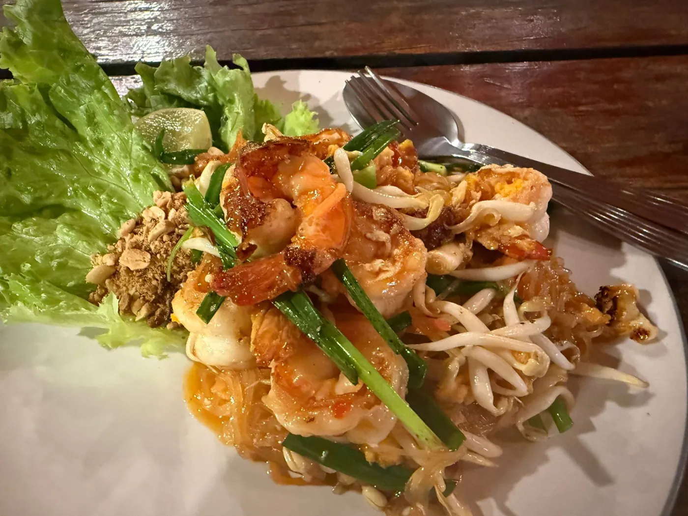 Plate of pad thai with prawns, bean sprouts, peanuts and lime at Kon Gin Sen, Koh Mak