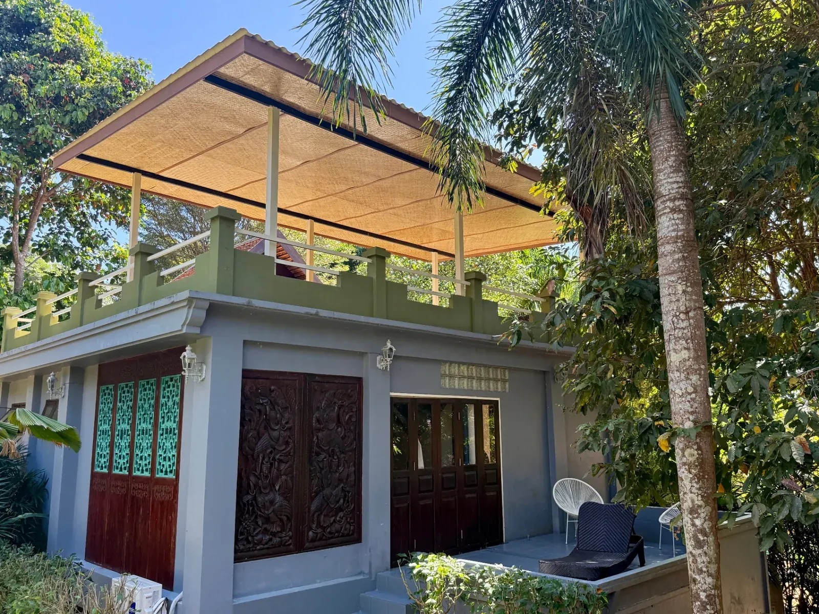 Sugarcane Villa, Two Bedroom — roof terrace with carved Thai doors