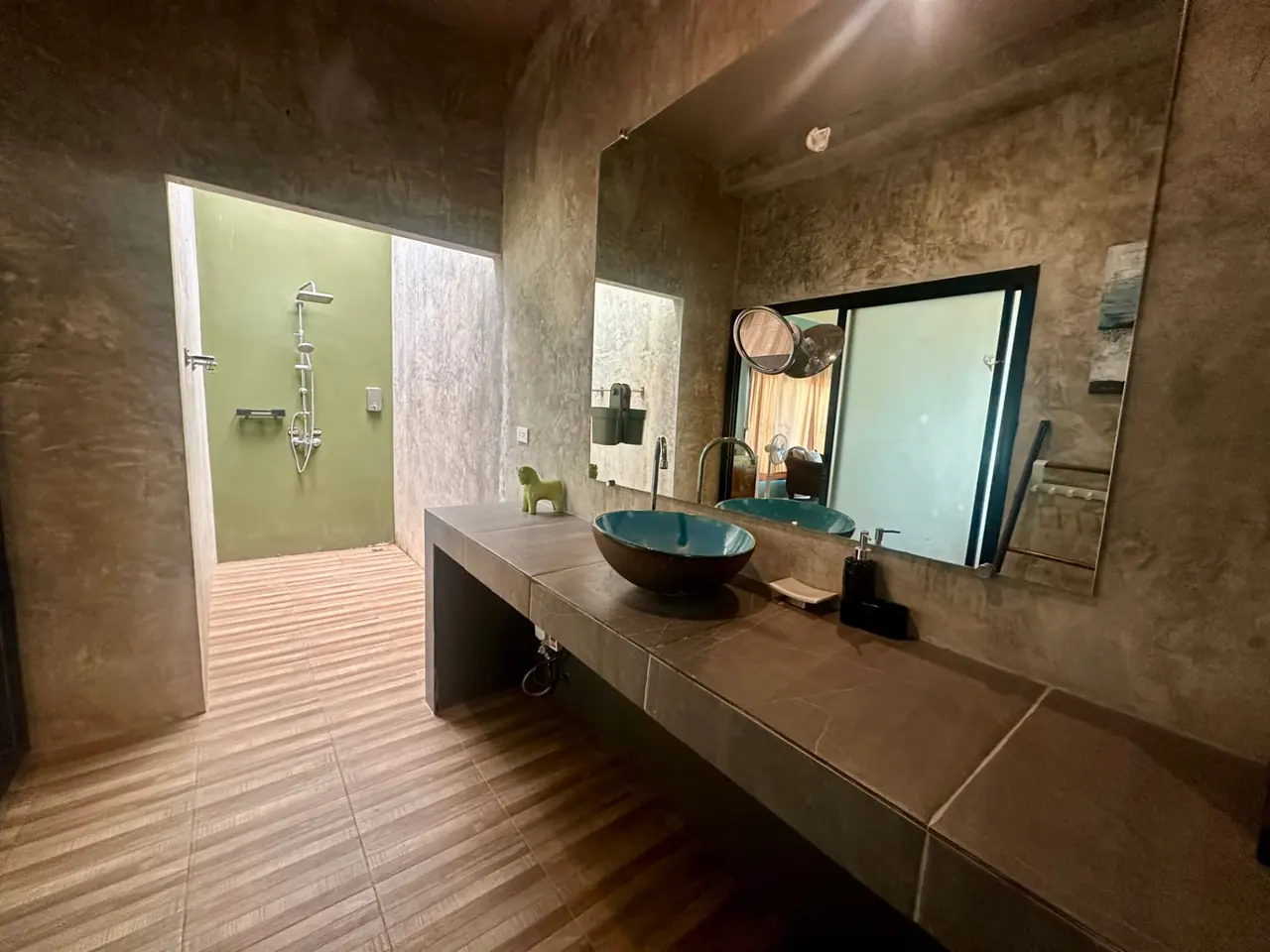 Spacious bathroom with double vanity and open-air shower at the Owners Beachfront Villa, Koh Mak, Thailand